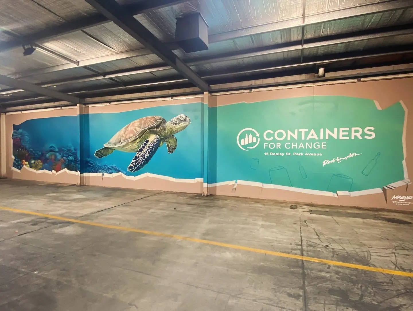 The undercover drive-through at the Park Avenue depot, with its sea turtle mural